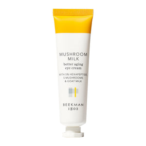Beekman 1802 Mushroom Goat Milk Eye Cream jar, featuring a creamy texture for under-eye circles and fine line reduction.