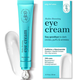 Caffeine Eye Cream tube with a silver Zinc Roller ball for cooling massage and depuffing.